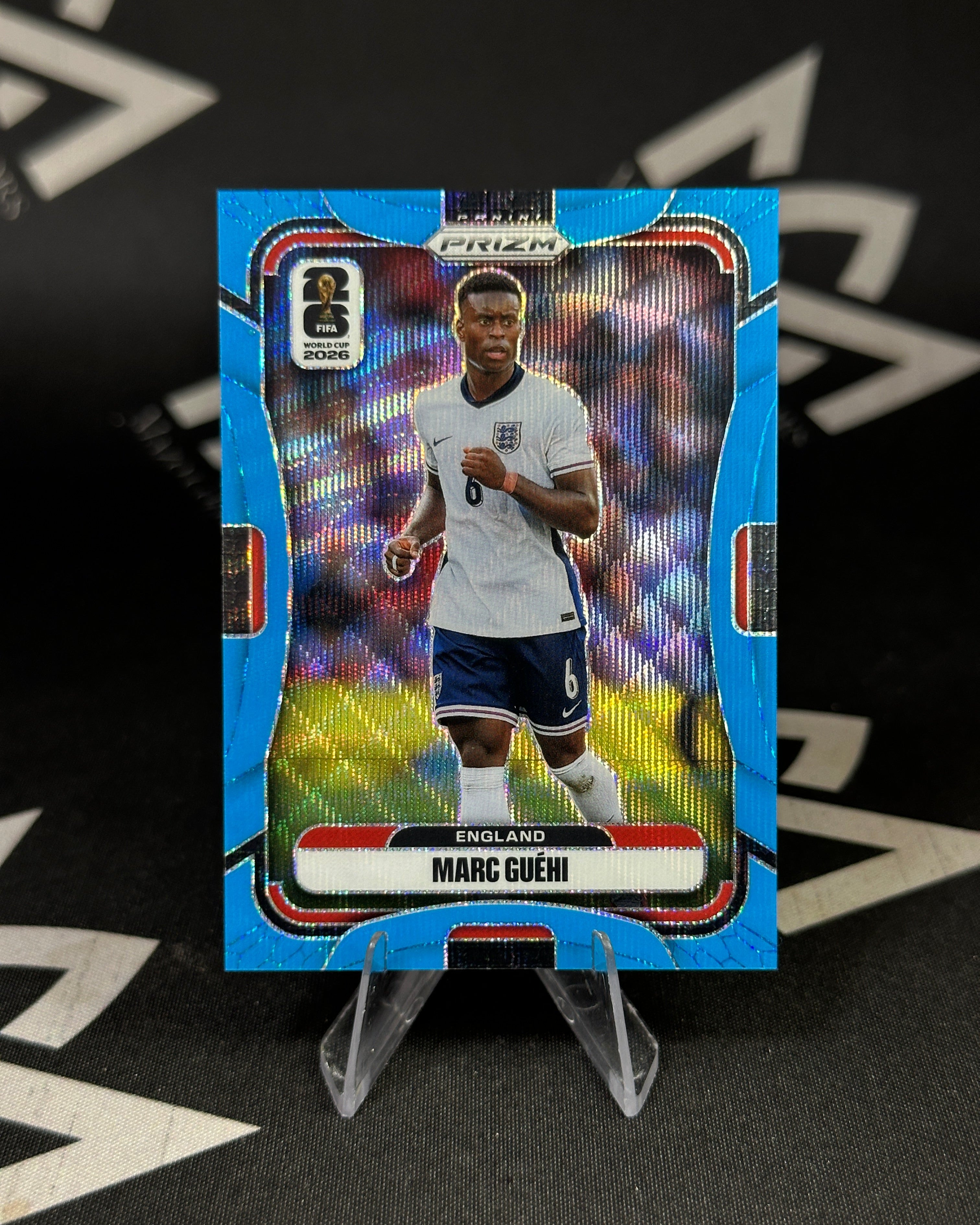 Marc Guéhi – Blue Prizm 144/225 - Panini Prizm FIFA World Cup 2026
